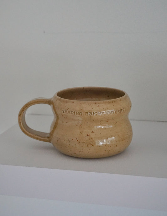 Puodelis "shaping bright futures"